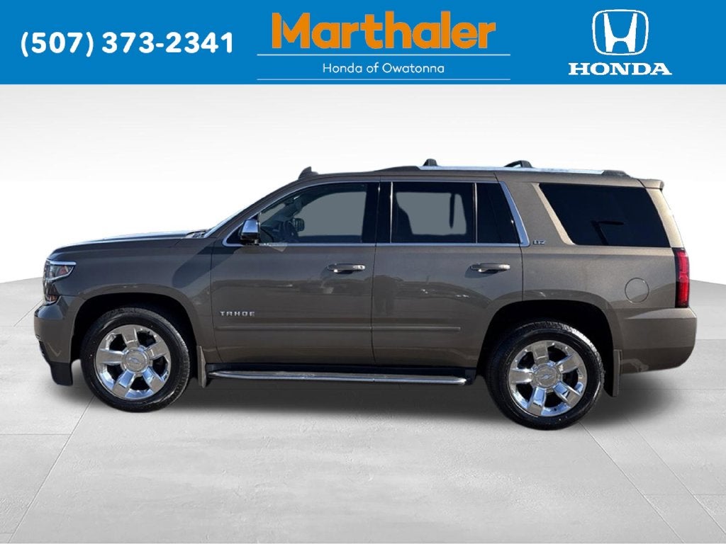 Used 2016 Chevrolet Tahoe LTZ with VIN 1GNSKCKC4GR117413 for sale in Owatonna, MN