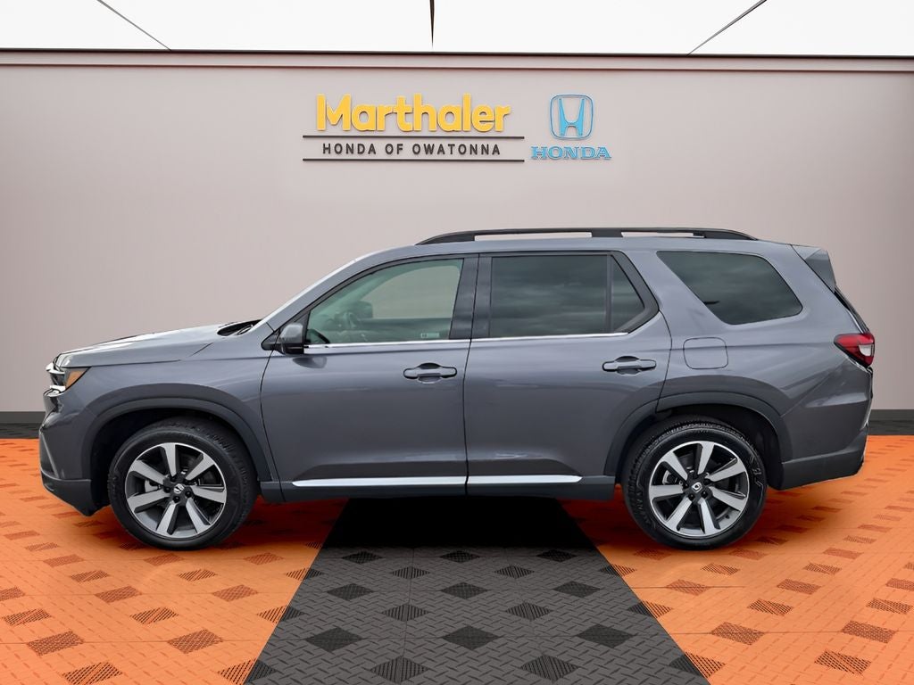 Used 2025 Honda Pilot Touring with VIN 5FNYG1H70SB192403 for sale in Albert Lea, Minnesota